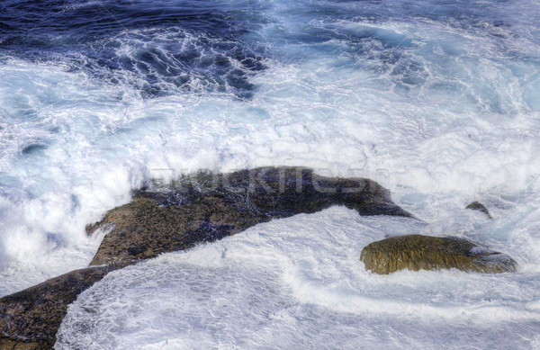 ocean waves crashing on rocks Stock photo © clearviewstock