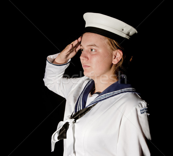 navy seaman saluting on black Stock photo © clearviewstock