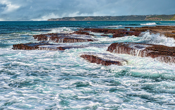 waves on rocks at the coast Stock photo © clearviewstock