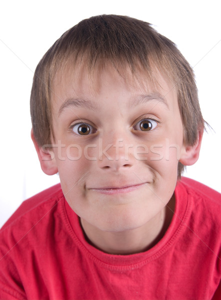 Băiat ochii mari izolat alb fericit Imagine de stoc © clearviewstock