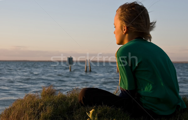 boy looking over lake Stock photo © clearviewstock