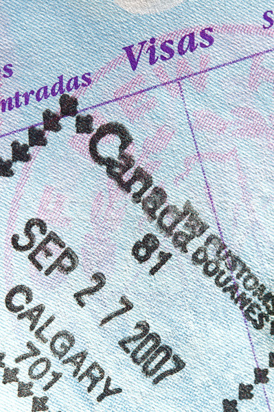 Paspoort stempel pagina Canada reizen boord Stockfoto © cmcderm1