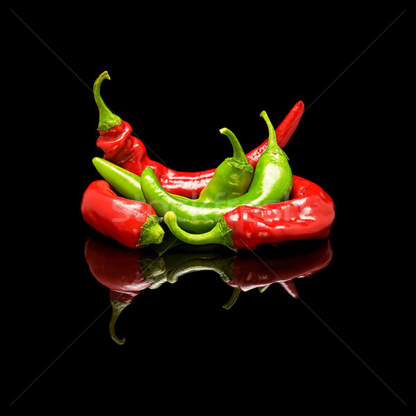 Mix of red and green hot chili peppers Stock photo © Coffeechocolates