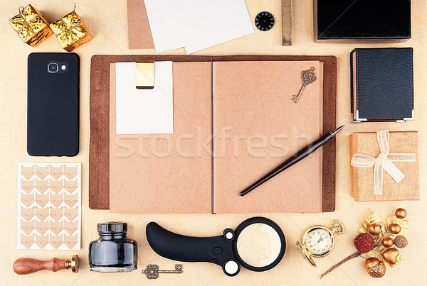 Open working notepad with brown kraft paper Stock photo © Coffeechocolates