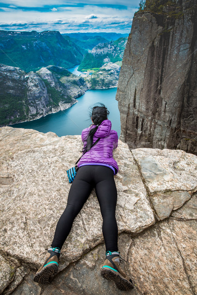 Prekestolen. Woman looking at the landscape from a height. Stock photo © cookelma