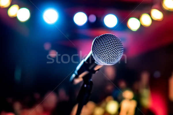 Microphone on stage against a background of auditorium. Stock photo © cookelma