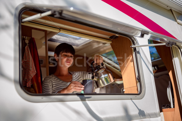 Woman cooking in camper, motorhome interior Stock photo © cookelma