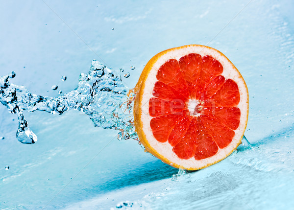 Pomelo agua Splash rojo naranja Foto stock © cookelma