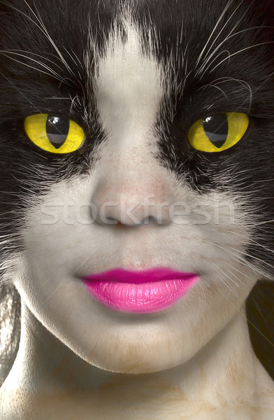 Stock photo: catwoman with brightly yellow eyes 