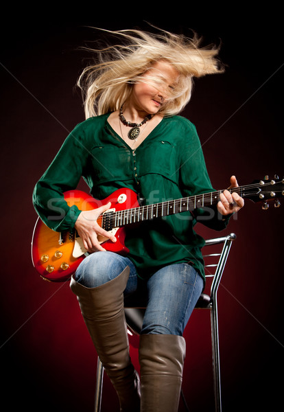 Dziewczyna gitara ciemne czerwony kobieta kobiet Zdjęcia stock © cookelma