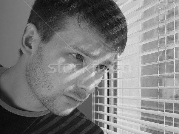 The person at a window.  Stock photo © cookelma