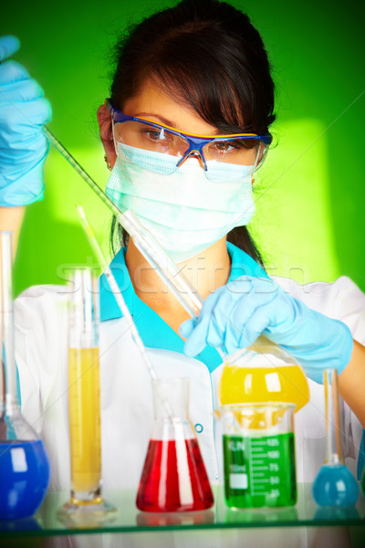 Tudós laboratórium teszt csövek fiatal kéz Stock fotó © cookelma