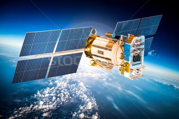 Space satellite over the planet earth Stock photo © cookelma