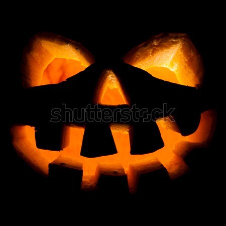 halloween, old jack-o-lantern on black Stock photo © cookelma