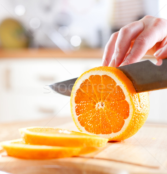 Сток-фото: рук · оранжевый · свежие · кухне · фрукты
