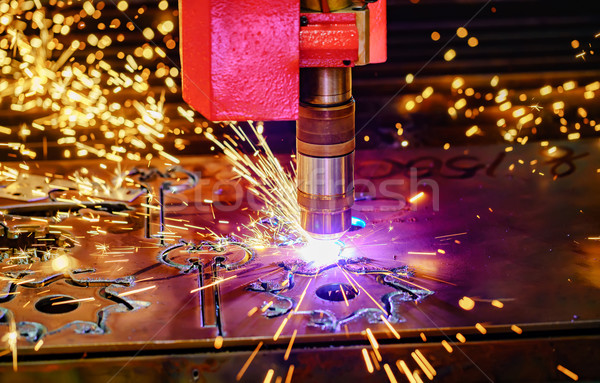 CNC Laser cutting of metal, modern industrial technology. Stock photo © cookelma