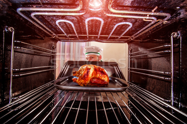 Kochen Huhn Ofen Küchenchef Brathähnchen Ansicht Stock foto © cookelma