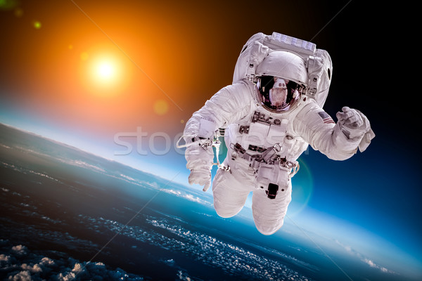 Astronaut de kosmische ruimte achtergrond aarde communie afbeelding Stockfoto © cookelma