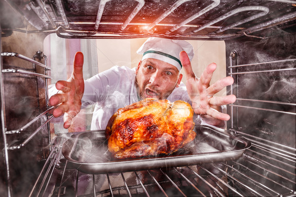 Amuzant bucătar-şef supărat pagubas Imagine de stoc © cookelma