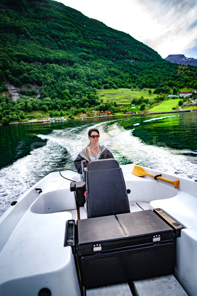 Frau fahren Motorboot schönen Natur Sonne Stock foto © cookelma