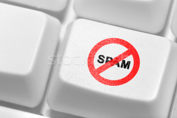 The button with an emblem of an antispam on the keyboard. Stock photo © cookelma