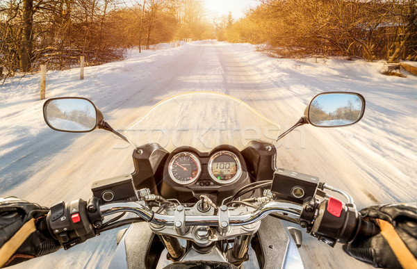 Biker Ansicht Winter rutschig Straße Sonne Stock foto © cookelma