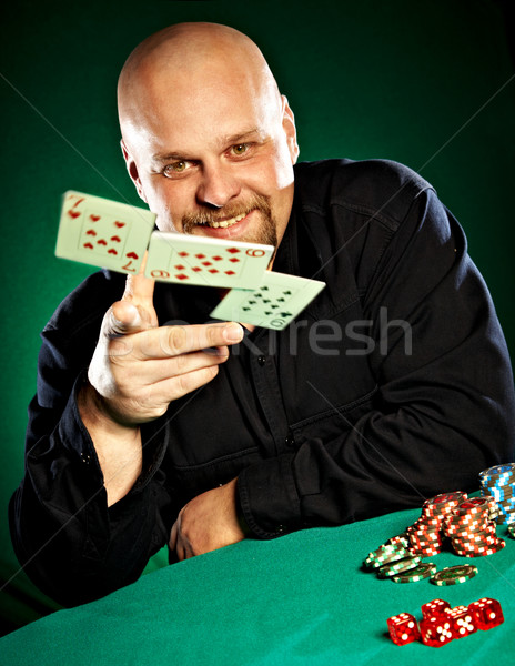 Uomo barba poker mano tavola successo Foto d'archivio © cookelma