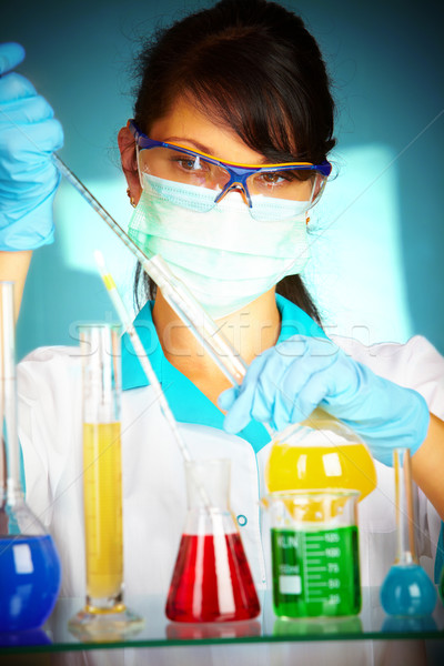 scientist in laboratory with test tubes  Stock photo © cookelma