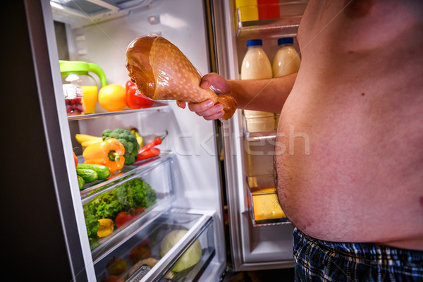 Hungrig Mann halten Türkei Bein Hände Stock foto © cookelma