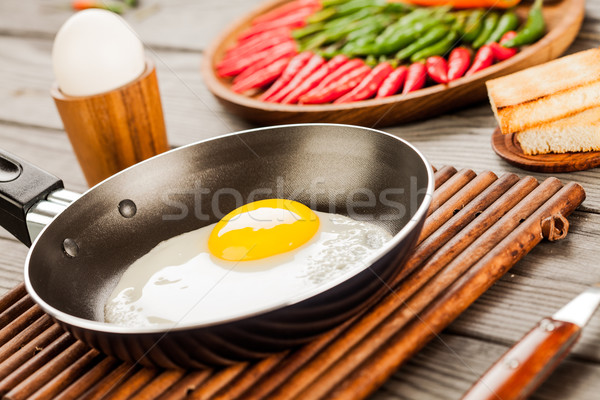 Frit oeufs table en bois déjeuner alimentaire cuisine [[stock_photo]] © cookelma