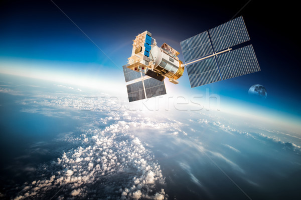 Space satellite over the planet earth Stock photo © cookelma
