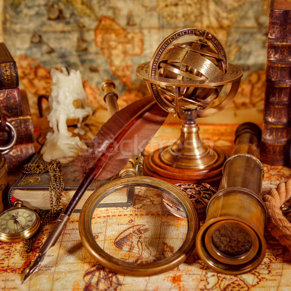 Vintage lupą leży starożytnych mapie świata martwa natura Zdjęcia stock © cookelma