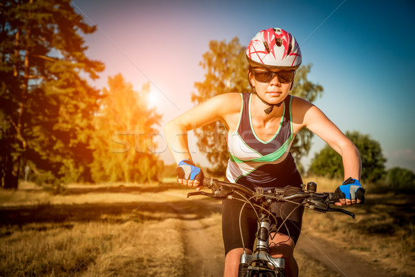 Kobiet rowerów charakter jazda konna niebo dziewczyna Zdjęcia stock © cookelma