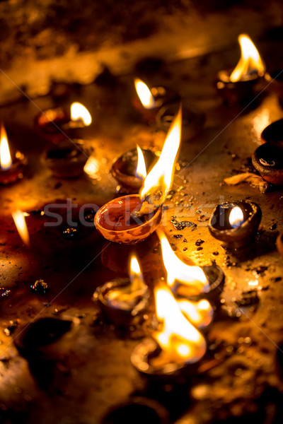 Burning candles in the Indian temple. Stock photo © cookelma