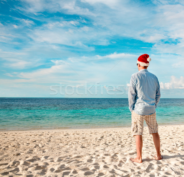 ストックフォト: 男 · サンタクロース · 帽子 · 熱帯ビーチ · クリスマス · 休暇