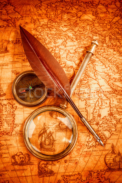 Vintage lente di ingrandimento bugie antica mappa del mondo bussola Foto d'archivio © cookelma