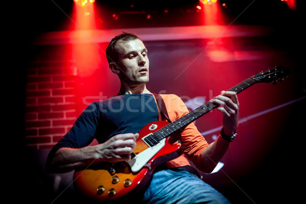 Band performs on stage in a nightclub Stock photo © cookelma