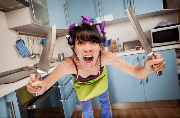 Crazy funny gospodyni domowa wnętrza kuchnia dziewczyna Zdjęcia stock © cookelma
