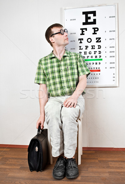 person wearing spectacles in an office at the doctor Stock photo © cookelma