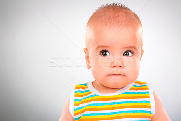 Copil ion gri zâmbet faţă Imagine de stoc © cookelma