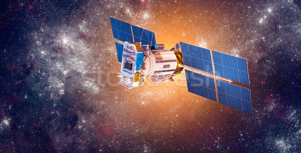 Space satellite over the planet earth Stock photo © cookelma