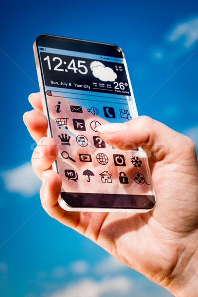 Smartphone transparent Bildschirm menschlichen Hände futuristisch Stock foto © cookelma