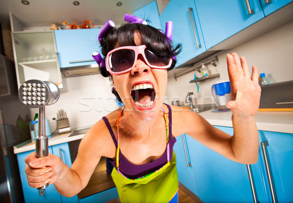 Fou ménagère intérieur cuisine femme femmes Photo stock © cookelma