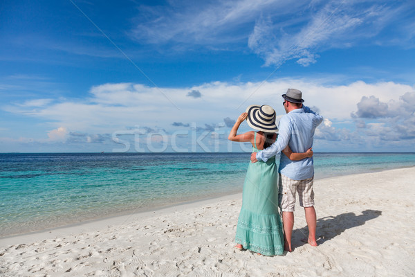 Stock photo: Vacation Couple walking on tropical beach Maldives.