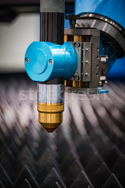 CNC Laser plasma cutting of metal, modern industrial technology. Stock photo © cookelma