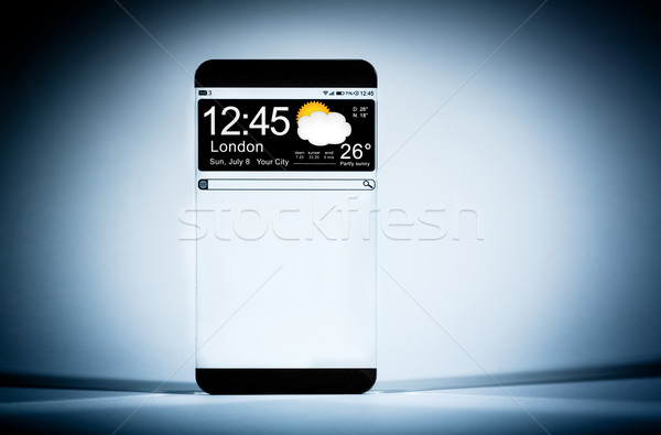 Smart phone (copy space display) with a transparent display. Stock photo © cookelma