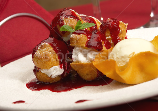 Tasty profiteroles on a dining table  Stock photo © cookelma