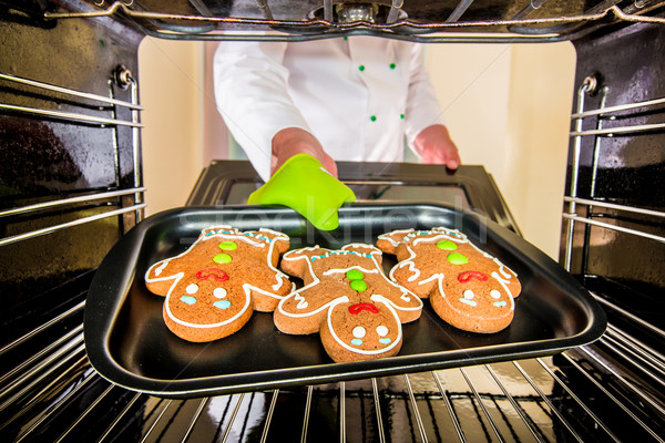 Baking Gingerbread man in the oven Stock photo © cookelma