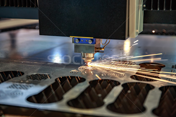 CNC Laser cutting of metal, modern industrial technology. . Stock photo © cookelma
