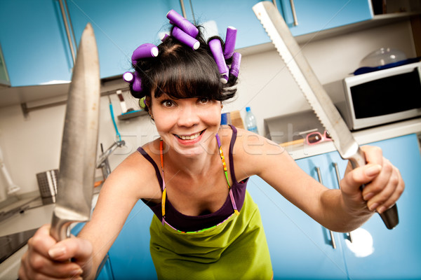 Nebun casnica interior bucătărie zâmbet femei Imagine de stoc © cookelma